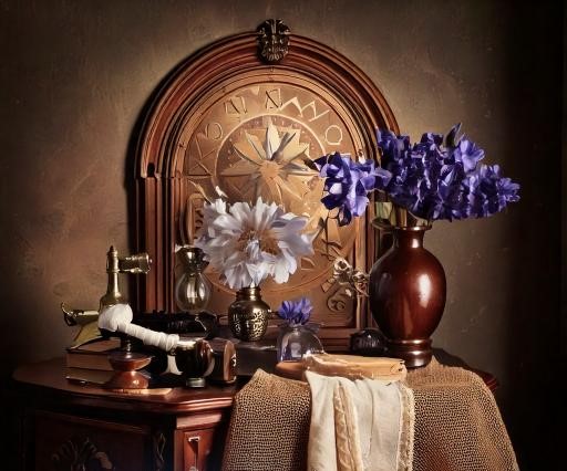 "Vintage decor with flowers and clock."