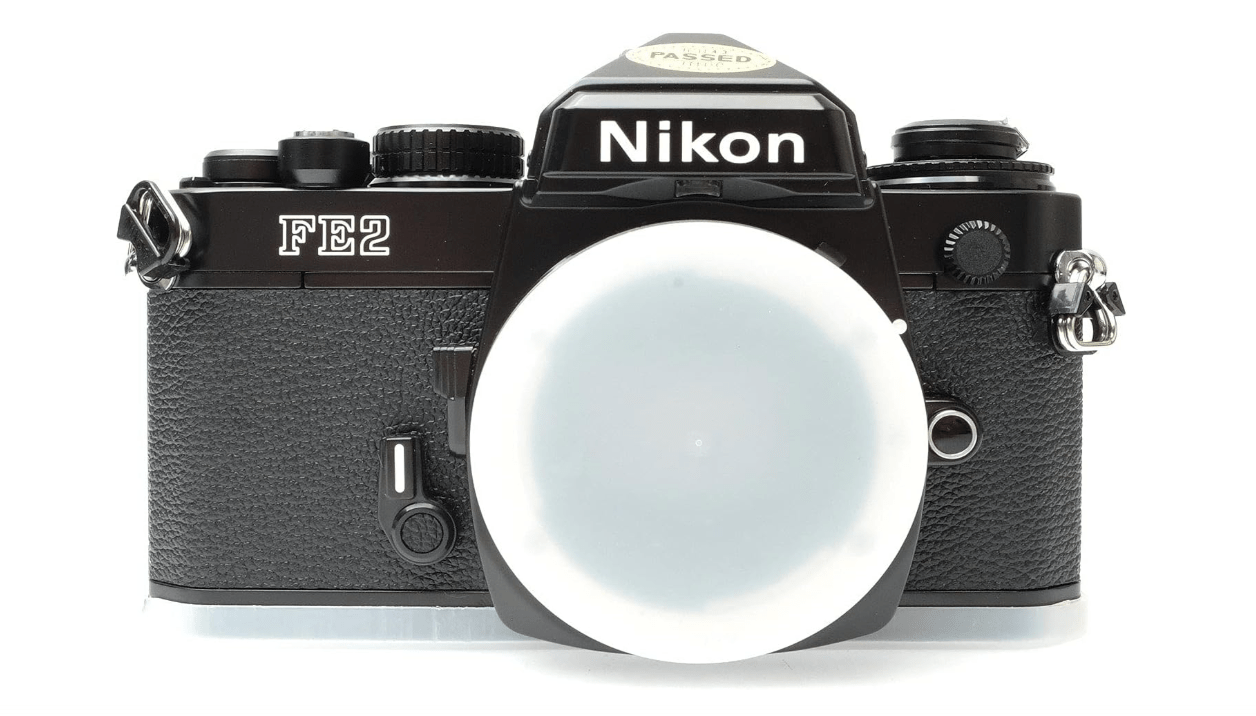  Nikon FE2 film SLR camera with black body; no lens