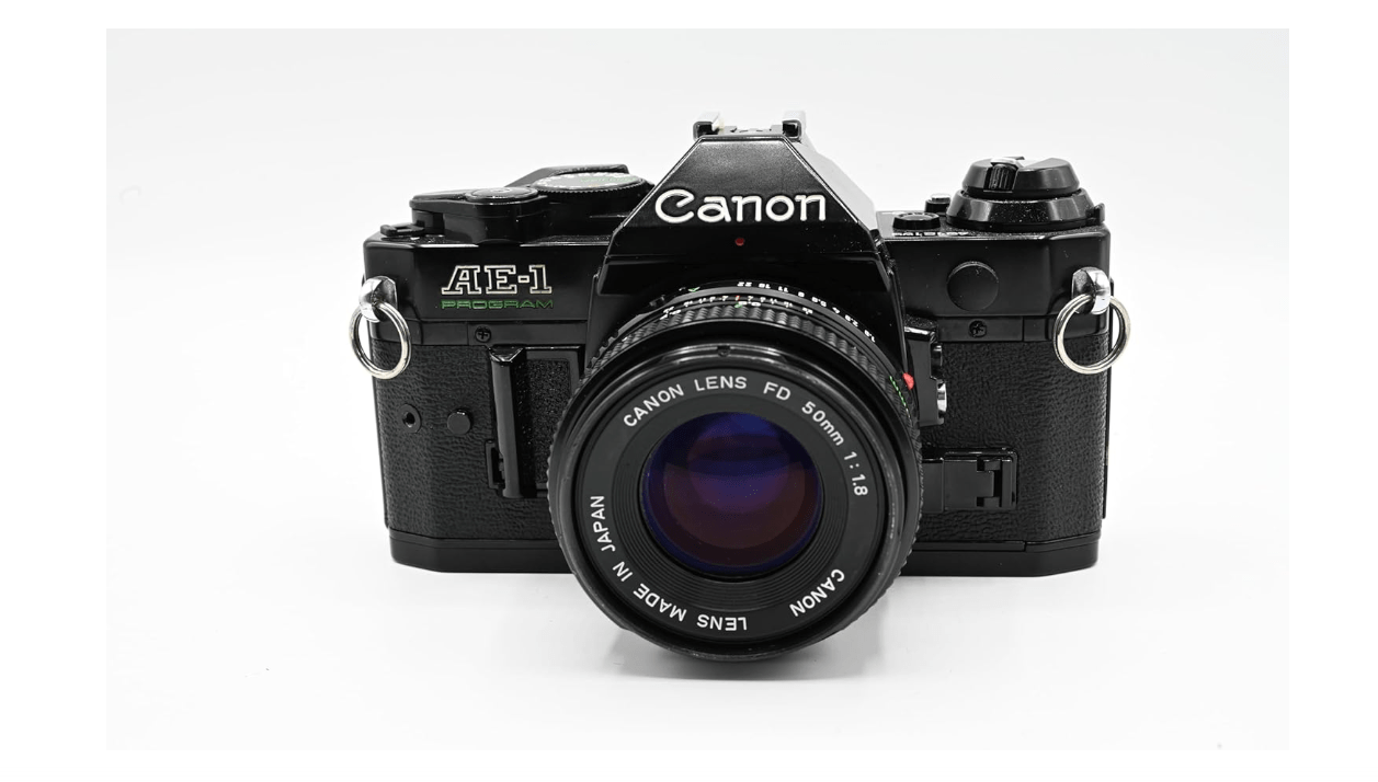 
Canon AE-1 Program 35mm SLR Camera with 50mm 1:1.8 Lens (Black) (Renewed)