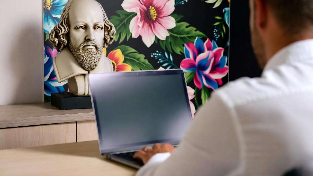 Writer with Shakespeare bust and floral wallpaper for modern content creation inspiration