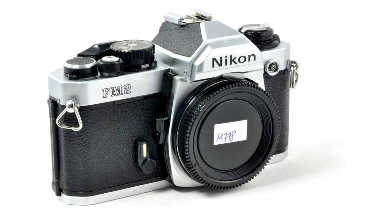 Nikon FM2 35MM SLR Film Camera with Titanium Shutter Manual focus FX Nikon Lens system (Renewed)