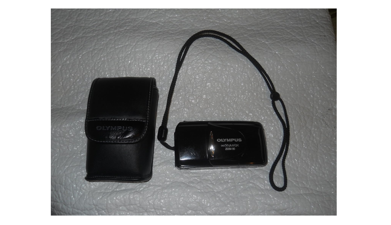 Olympus Stylus 120 35mm Point and Shoot Film Camera with 38-120mm Lens and built-in Flash. Autoloader and rewinder. Compatible with Color and B&W film....