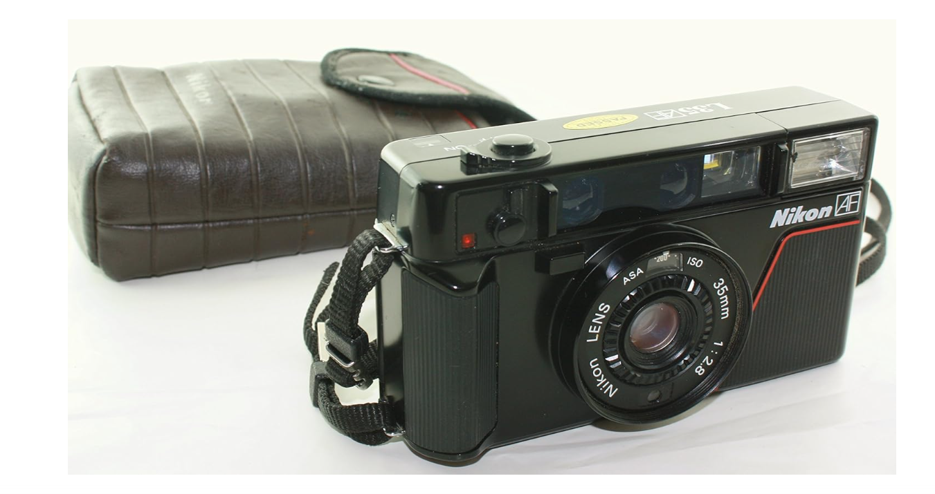 Nikon L35 AF One Touch L35AF Point and Shoot 35MM Film Camera Bulit-in Flash, AF lens, Film loader (Renewed)