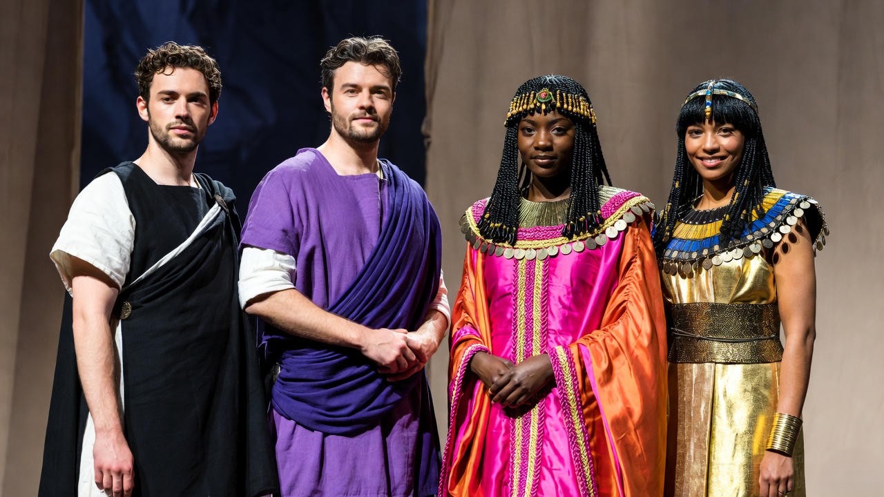 RSC-inspired Antony and Cleopatra costumes contrasting Roman austerity with Egyptian opulence in vibrant colors