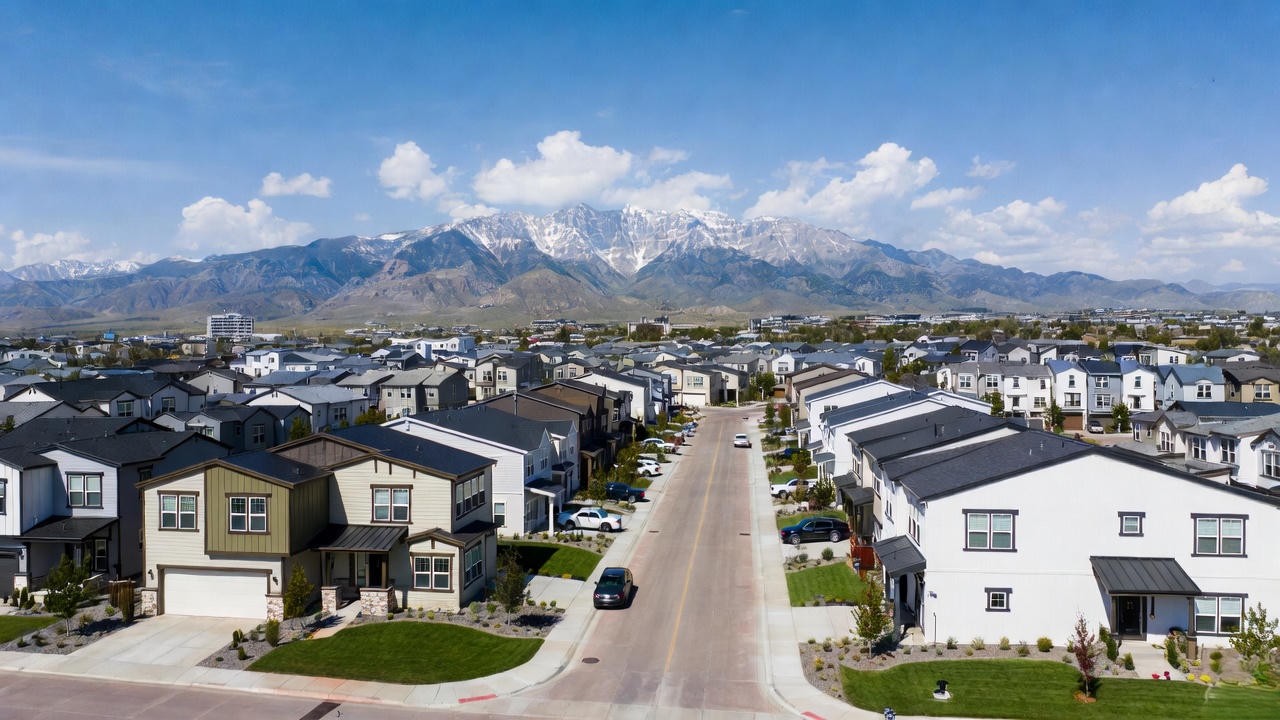 Modern Hamlet Homes Utah neighborhood with contemporary homes and Wasatch Mountains in the background