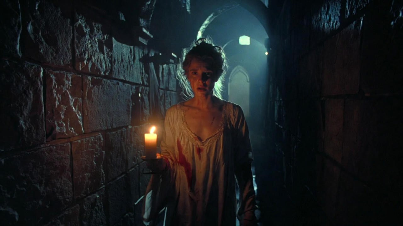 Lady Macbeth sleepwalking with candle in dark castle, revealing inner guilt through stage directions in Shakespeare's Macbeth