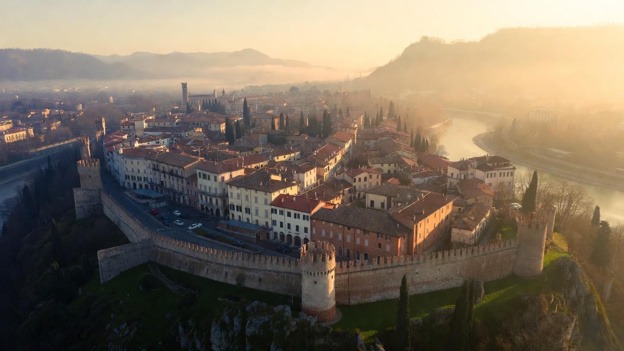 Renaissance Verona Italy with Adige River and ancient city walls at golden hour, illustrating the compact urban setting of Romeo and Juliet