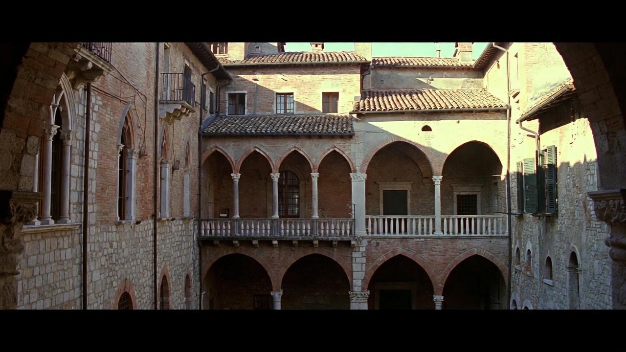 Renaissance Verona courtyard and balcony in golden sunlight, reminiscent of Zeffirelli's 1968 film adaptation of Romeo and Juliet