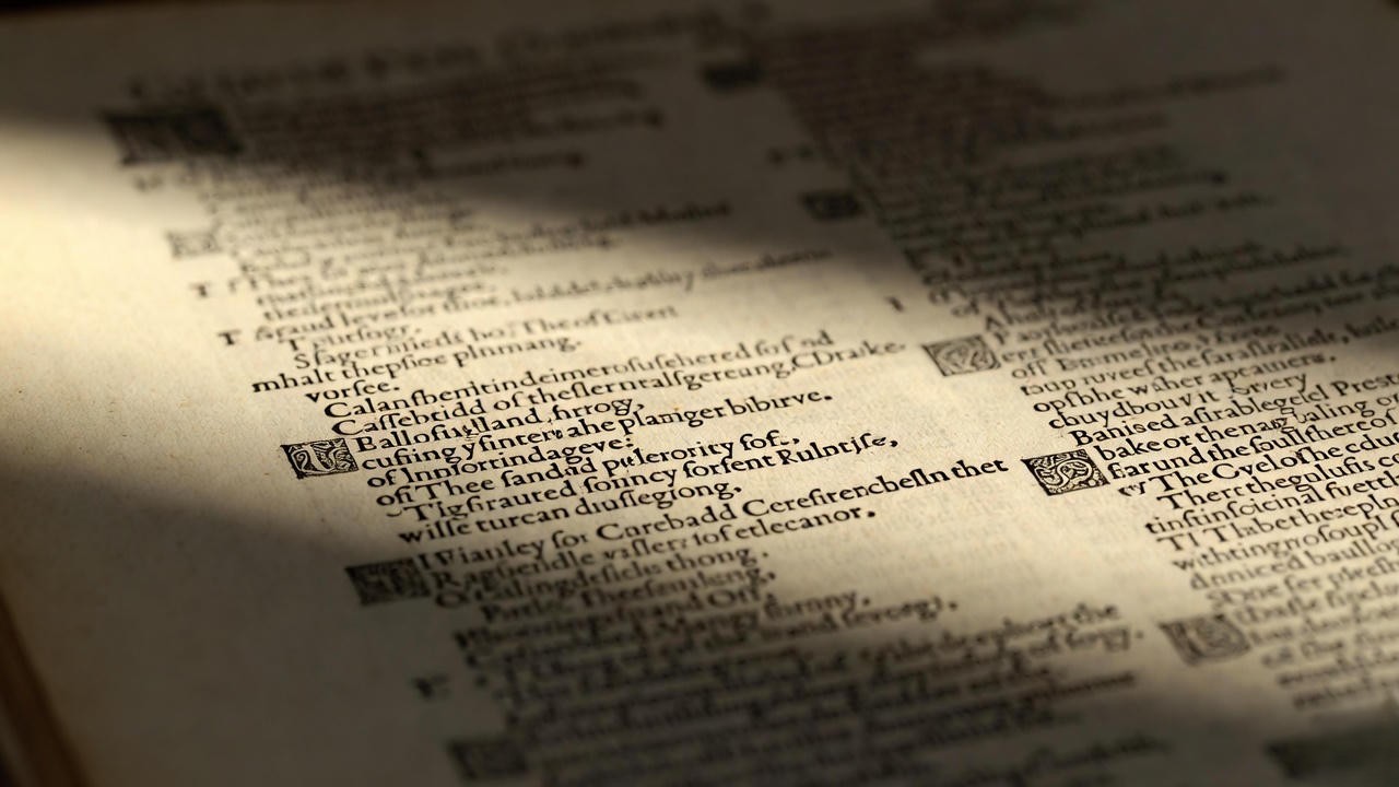Close-up of original 1623 First Folio page showing Elizabethan old-spelling typography from Julius Caesar
