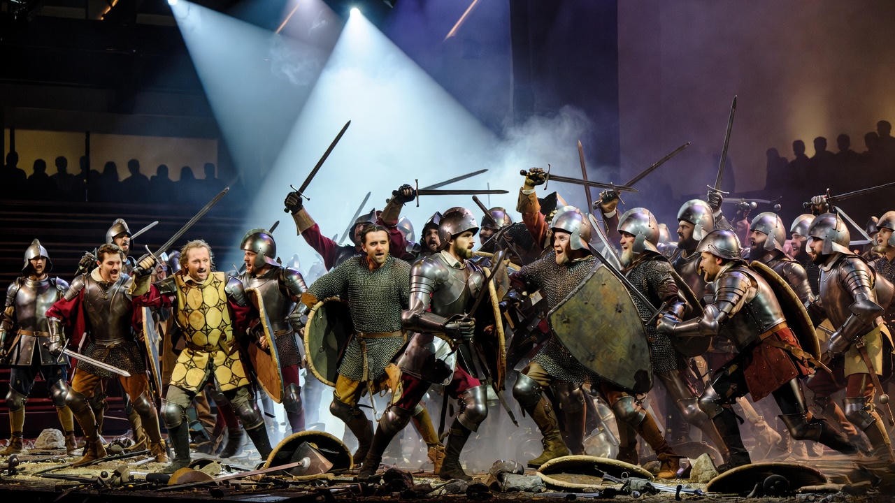 Actors performing the Battle of Agincourt scene in Royal Shakespeare Company production of Henry V on thrust stage