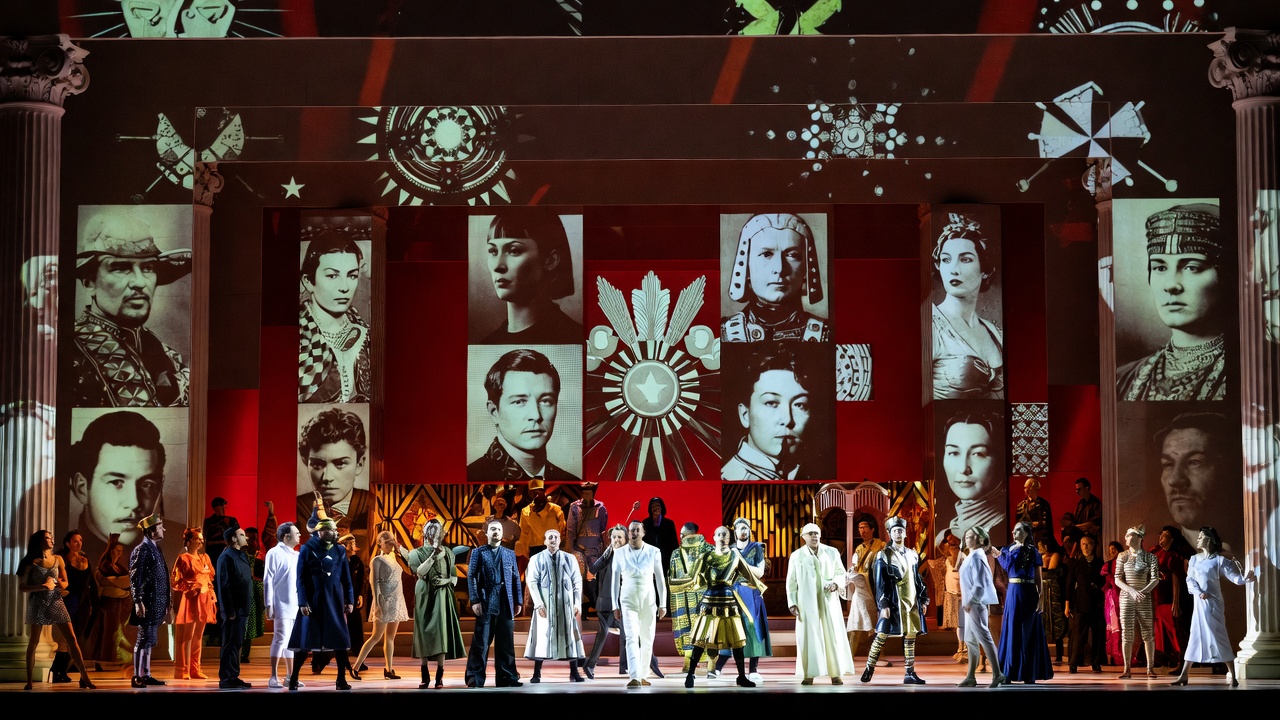 Metropolitan Opera stage with projections and ensemble in John Adams' Antony and Cleopatra modern production