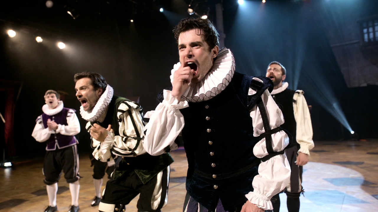 Modern stage performance of Romeo and Juliet opening scene with Sampson biting his thumb