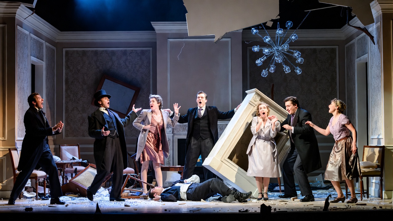 Cornley Drama Society cast in mid-chaos during The Play That Goes Wrong performance showing actors vs characters layers