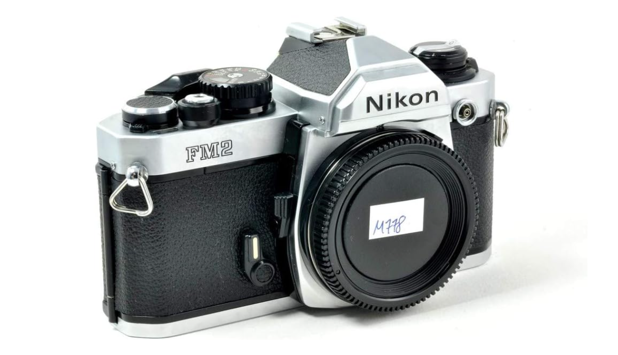 Nikon FM2 35MM SLR Film Camera with Titanium Shutter Manual focus FX Nikon Lens system (Renewed)
