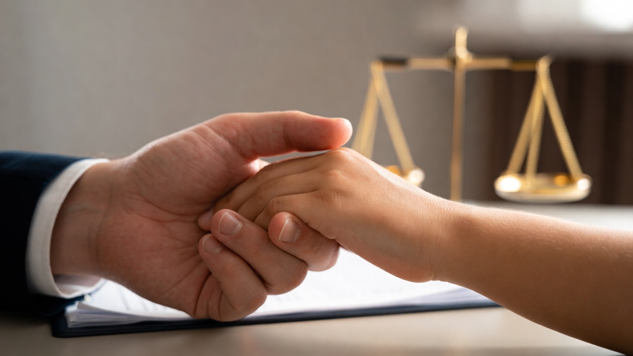 Symbolic hands holding representing close-in-age relationships under Oregon Romeo and Juliet law exemptions.