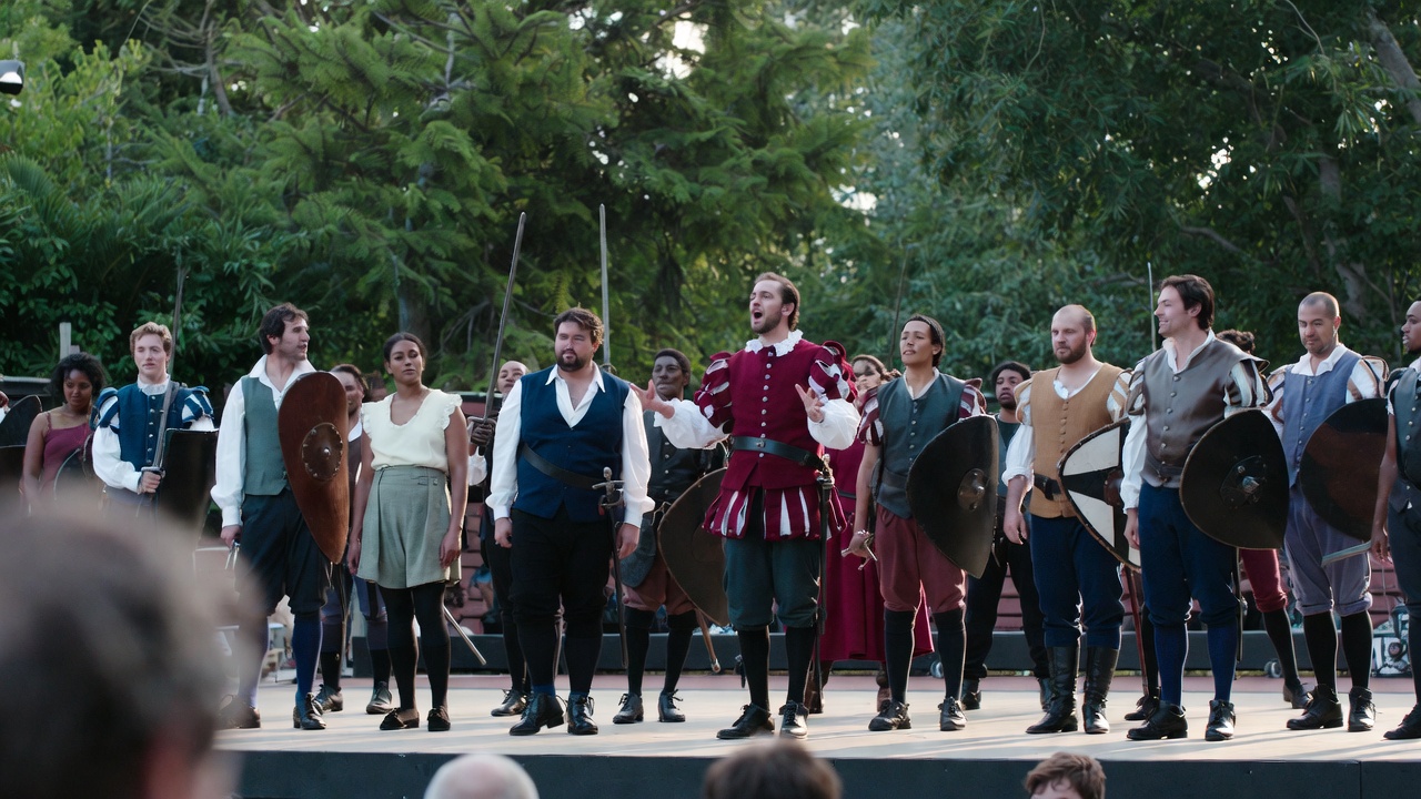Diverse cast performing Shakespeare's Henry V at American outdoor Shakespeare festival modern production scene