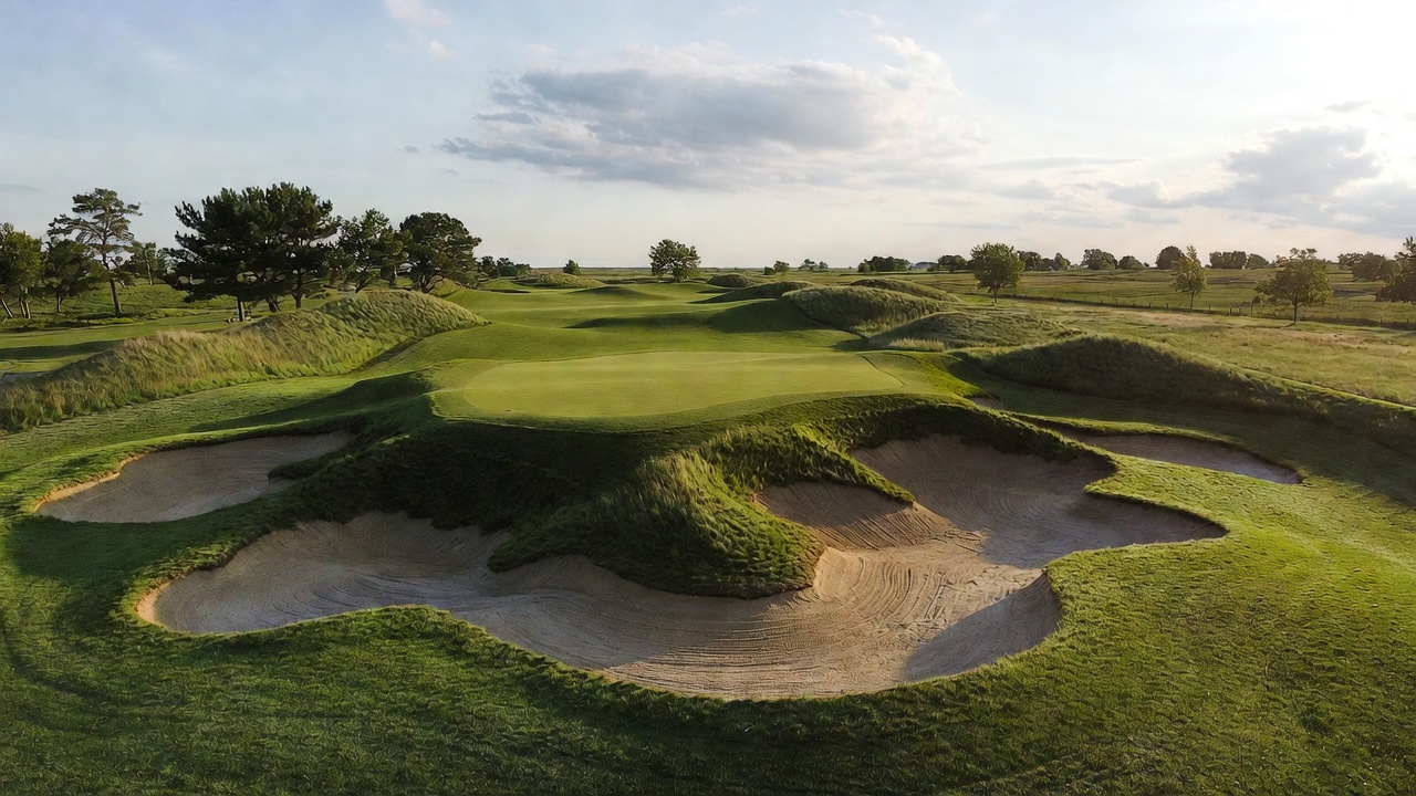 Sand bunkers and elevated green at Hamlet Golf Course Indiana