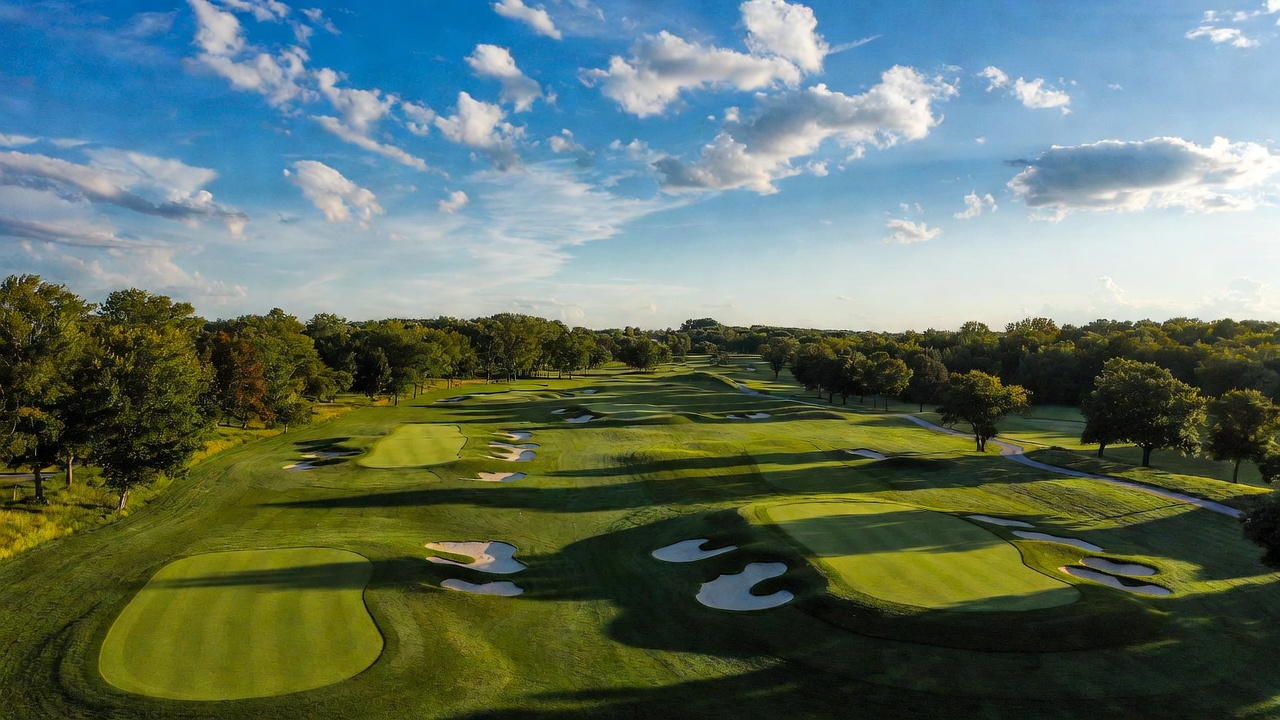 Lush green fairways of Hamlet Golf Course in rural Indiana countryside