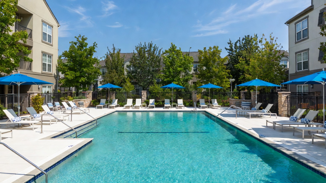 Resort-style saltwater pool and lounge area at Hamlet Watkins Centre rental community in Virginia