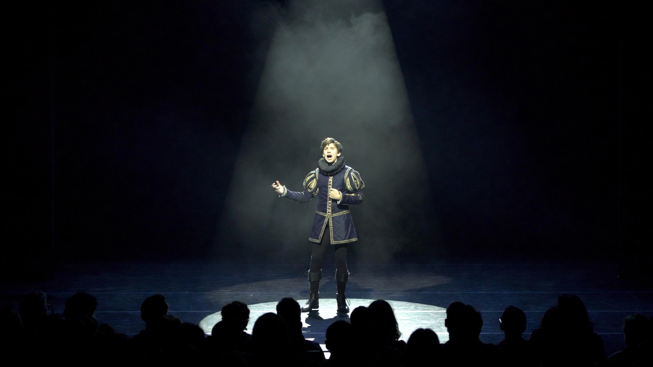 Modern theatrical performance of Hamlet soliloquy connecting to heaven up there and contemporary relevance