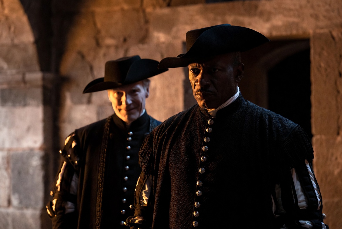 Othello and Iago dynamic in the 1995 film adaptation showing trust and hidden betrayal