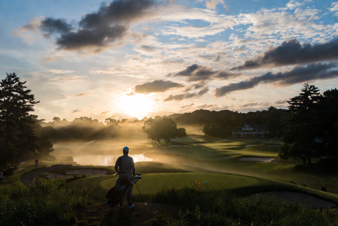 Shakespearean-inspired view of The Hamlet Golf and Country Club golf course in Commack NY with contemplative golfer