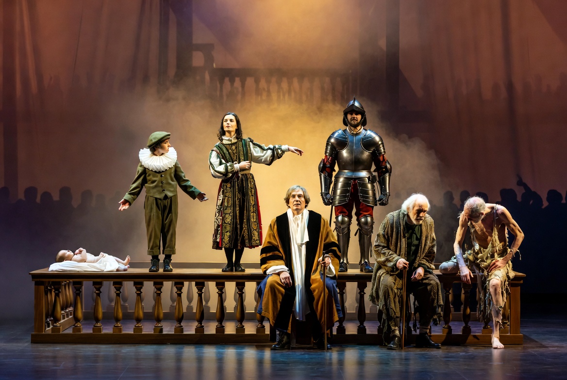 Shakespeare All the World’s a Stage metaphor visualized through seven ages of man on Elizabethan theater stage