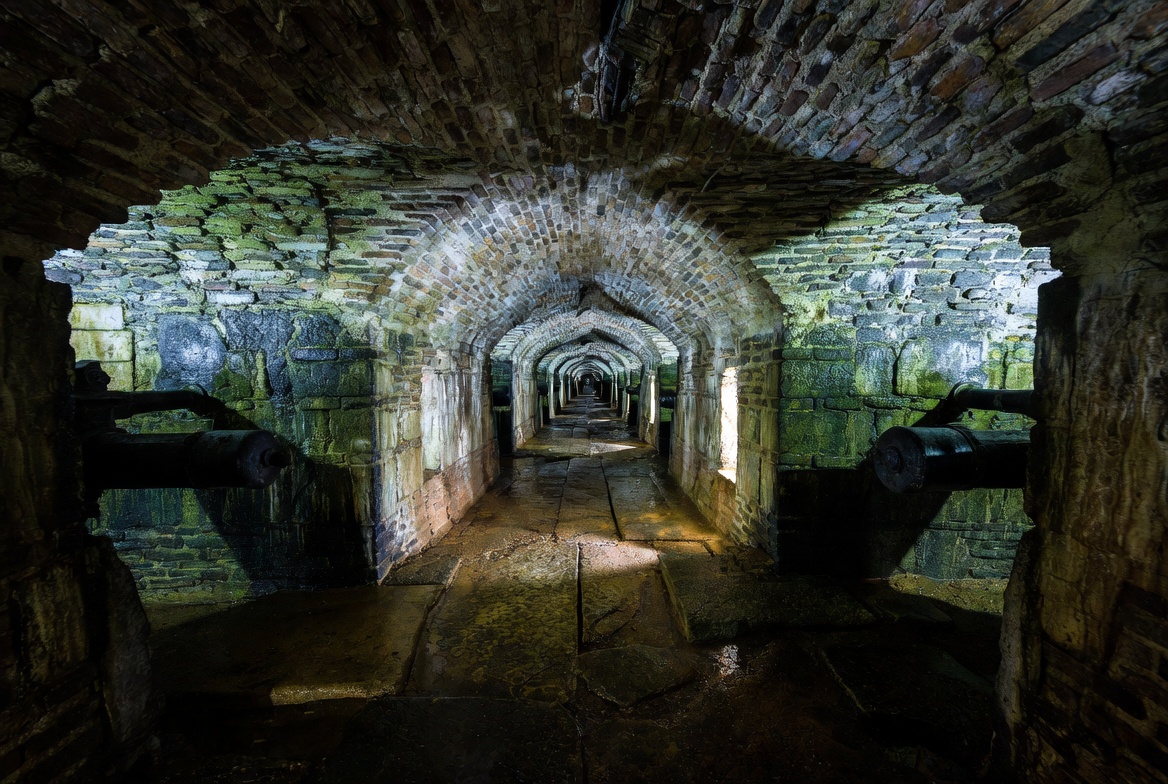 Dark underground casemates and tunnels inside Kronborg Castle Denmark