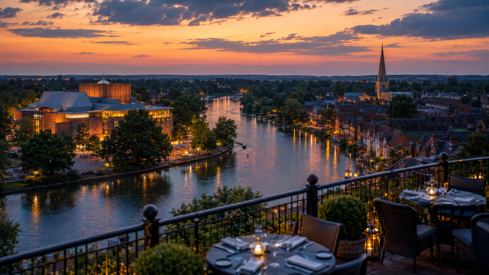 Sweeping panoramic view of the River Avon and Royal Shakespeare Theatre from an elevated terrace at dusk in Stratford-upon-Avon, demonstrating scenic pre-theater ambiance.